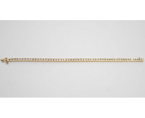 14ct Yellow Gold Round Brilliant Cut Diamond Tennis Bracelet  The Bracelet consists of Fifty-Six Round Brilliant Cut Diamonds