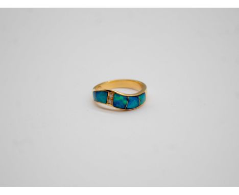 18ct Gold Opal Doublet and Diamond Dress Ring The ring contains five thin slices of natural Opal on a black backing of either
