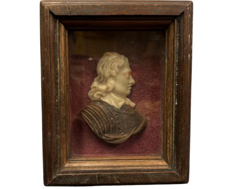 An early 19th century wax relief profile portrait bust miniature possibly of Oliver Cromwell, 13 x 9cm