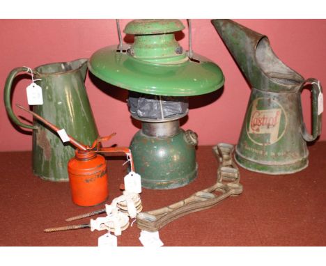 A vintage Castrol half gallon jug "WakefieldCastrol Motor Oil, The Masterpiece in oils", 31.5cm high, a green enamel Aladdin 