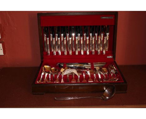 A canteen of Community plate flatware for twelve and a Community plate ladle, boxed