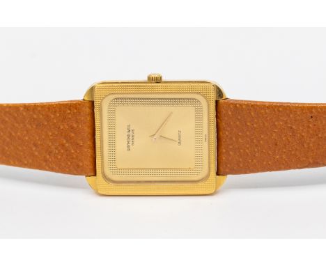 Gents 18K Gold Plated Raymond Weil Geneve Quartz Watch with Tan Leather Strap.  The watch face is rectangular shaped and meas