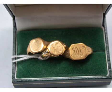 Three 9ct Gold Engraved Signet Rings. One of them has a split shank.  All rings are hallmarked "375" for 9ct Gold. Total Gros