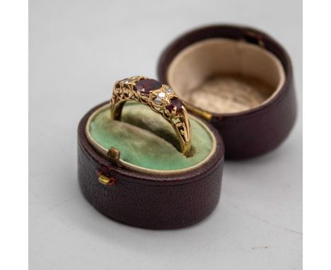 9ct Gold Red Paste Stone and Colourless Paste Ring The Ring is hallmarked "375" for 9ct Gold.  Ring Size P.  Total Gross Weig