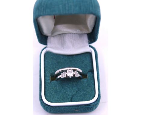18ct White Gold Old European Cut Diamond Ring with Baguette Cut Diamond Shoulders with a Platinum Wedding Band.  The Diamond 