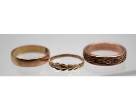 18ct Gold Wedding Band and two 9ct Gold Wedding Bands The 18ct Gold Wedding Band is hallmarked "18K" for 18ct Gold and measur