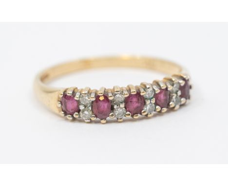 9ct Gold Ruby and Diamond Half Eternity Ring  The Ring contains five Oval Brilliant Cut Rubies that measure between 2.50mm-3.