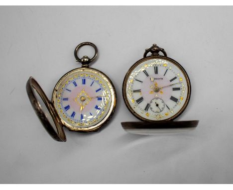 Two Ladies Silver Pocket Fob Watches  One of them is a "0,935" stamped Silver LA BEAUTE Pocket Fob Watch.  This Pocket Fob Wa