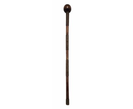 An African Zulu Knobkerrie / war club. Hard wood with a bulbous head, the shaft having four sections of two tone braided wire