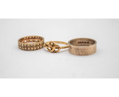 Three 9ct Gold Rings.  To include a 9ct Gold Knot Ring, a 9ct White Gold Wedding Band and a 9ct Yellow Gold Round Brilliant C