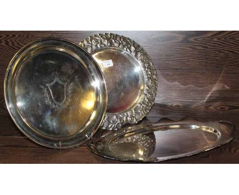 THREE SILVER PLATED TRAYS
one tray with raised chased border, with designs of stylised flowers, the largest tray 45cm wide 
s