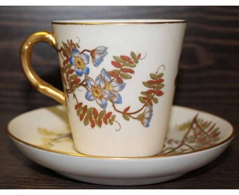 ROYAL WORCESTER HAND PAINTED CUP AND SAUCER 
decorated with flowers