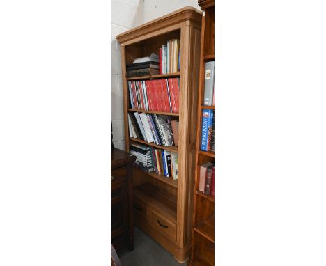 A modern light oak freestanding open bookcase with four shelves over two drawers, 90 cm wide x 34 cm deep x 192 cm high 