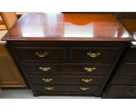 A Brights of Nettlebed George III style mahogany crossbanded chest with full-width brushing slide over two short and three lo