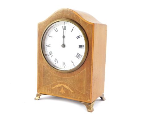An Edwardian mahogany and inlaid mantel clock, enamel dial bearing Roman numerals, clock work movement, the case of domed for