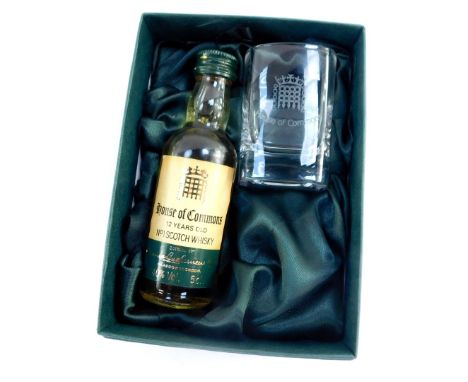 A 5cl bottle of House of Commons 12 years old number 1 Scotch Whisky, together with a whisky glass, boxed. 