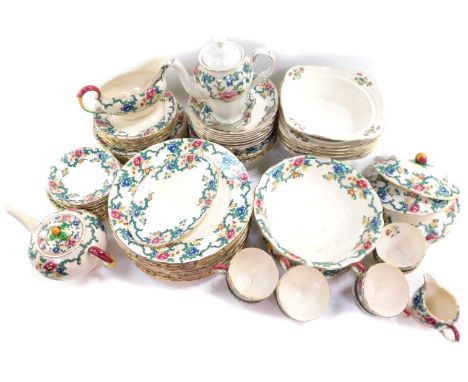 A Royal Cauldon pottery part dinner and tea service decorated in the Victoria pattern, comprising four vegetable tureens and 