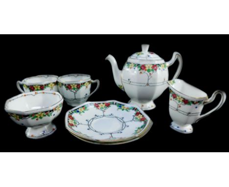 A Royal Doulton porcelain tete a tete decorated in the Arvon pattern, printed and painted marks, comprising teapot, cream jug