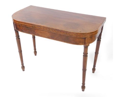 A George III mahogany demi lune folding card table, with cross banded top, raised on turned legs, 70cm high, 92cm wide, 46cm 