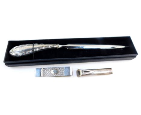 A silver button hole, Birmingham 1992, a silver and 18ct gold clip, and a paper knife, with a silver handle, marriage, foliat