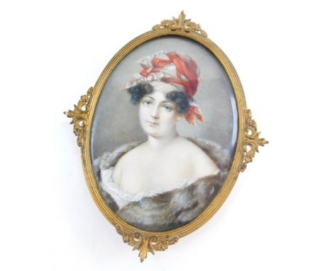French School (19thC). Half length portrait of a lady, clad in furs and a hat, watercolour miniature, 81mm high, 59mm wide.