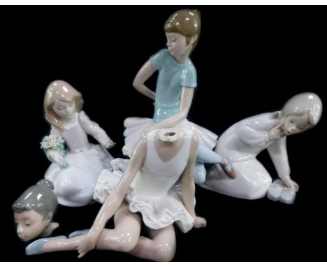 A Lladro porcelain figure group modelled as Forest Land  Encounter, boxed, together with a figure of a ballerina sitting on a