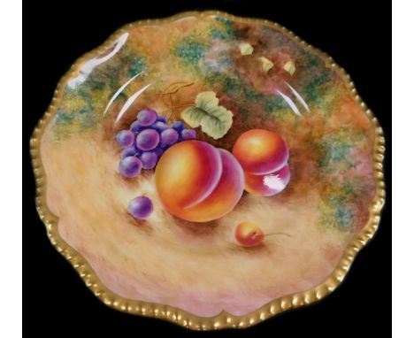 A Royal Worcester porcelain cabinet plate, signed Leaman,  painted with peaches and black grapes, 22cm diameter.