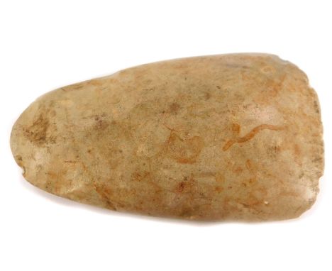 A Neolithic axe head, purportedly from The New Forest, Hampshire, possibly originating from The Alps, 11cm wide.
