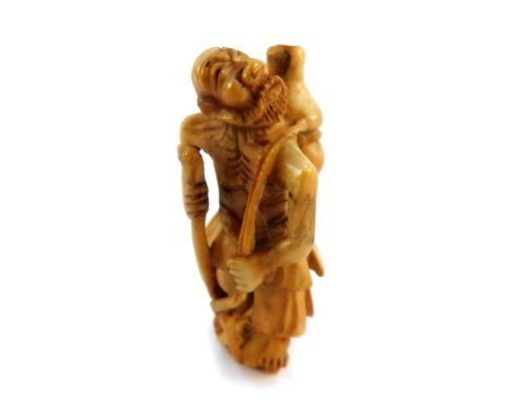 A Japanese ivory netsuke, of the emaciated Immortal Gama Sennin with gourd on his back, unsigned, probably Meiji period, 44mm