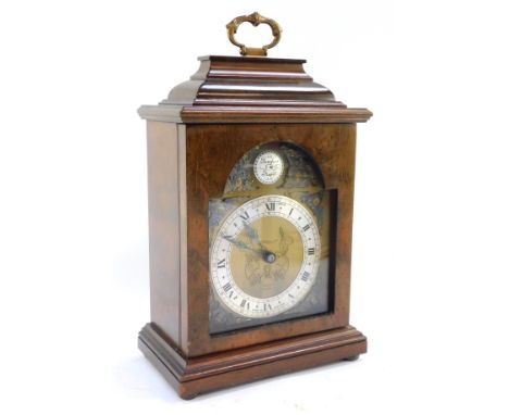 An Elliot of London walnut cased mantel clock, retailed by S T Hopper of Boston, 27cm high.