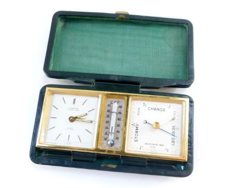 A Looping vintage travel clock with barometer and thermometer, eight day movement, number 80540, in a green leather case, 12.