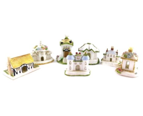 Seven Coalport porcelain pastille burners, comprising The Parasol House, Dove Cote, The Gate House, Keepers Cottage, The Summ