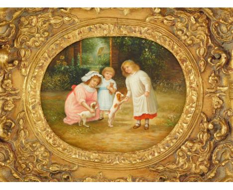 Continental School. Victorian children playing a garden with puppies, oil on board, 18.5cm high, 23.5cm wide.