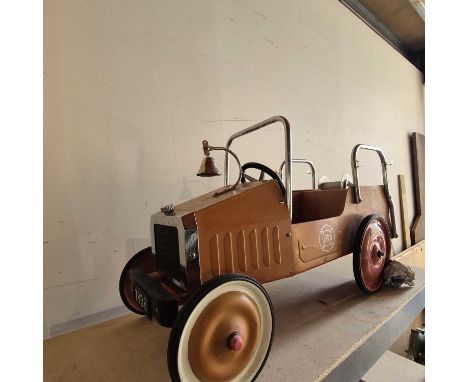 Vintage style Tin Plate pedal car in the form of a Fire truck