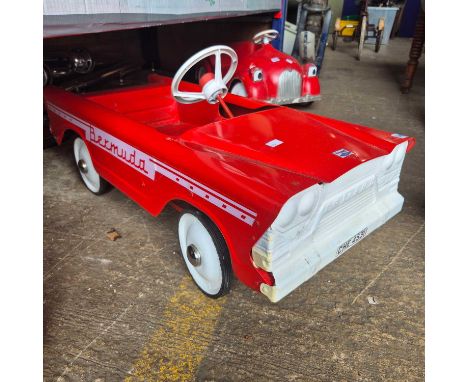 A vintage Tri-Ang Bermuda, tin plate pedal car.