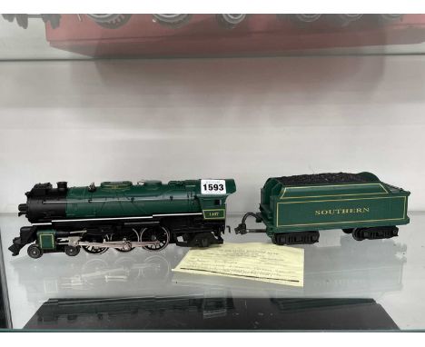 A Lionel 0 guage electric Southern locomotive and tender