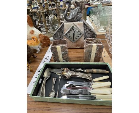 An Art Deco marble clock garniture together with some electroplate cutlery and a copper bed pan. 