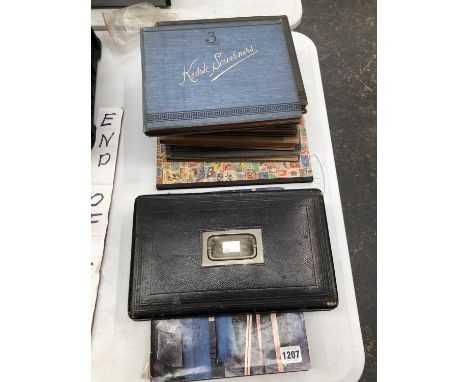 Five Kodak souvenir books with photographs, a stamp album, a Hugot &amp; Eyraud case and a Picasso book.