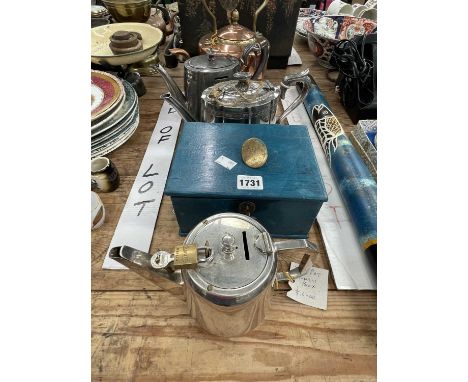 An electroplate tea pot money box, two other tea pots, a copper kettle and a blue painted wooden box