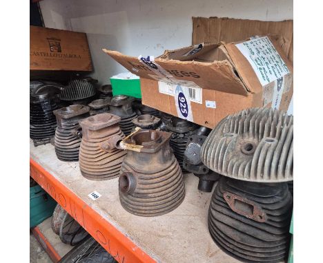 A large collection of Villiers and other Motorcycle engine Cylinder barrels and heads, pistons etc. together with a Klaxon mo