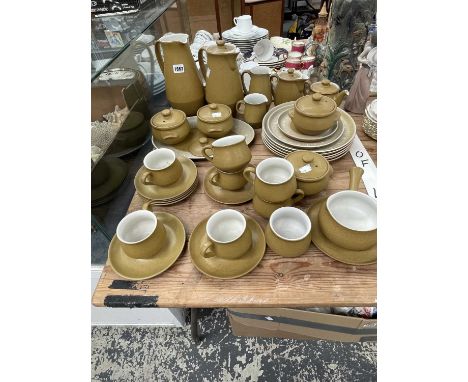 A Denby burnt orange stone ware breakfast set