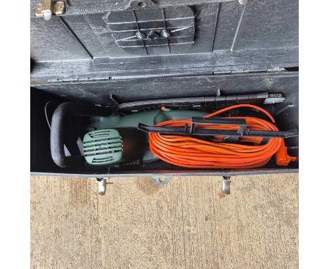 A boxed electric chainsaw.