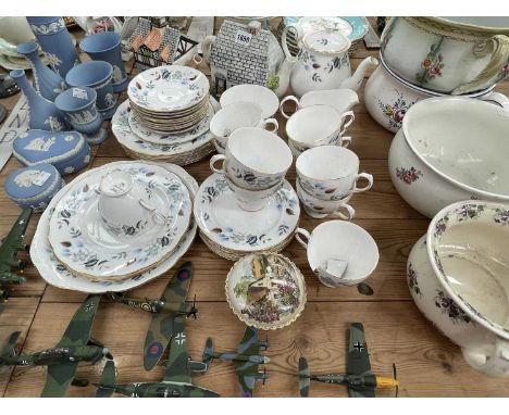Die cast WWII airplanes, Colclough tea wares, Wedgwood blue jasper, chamber pots, etc.