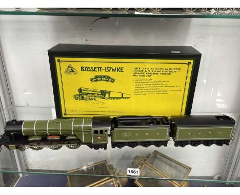 A boxed Bassett-Lowke 0 guage Flying Scotsman locomotive and two tenders