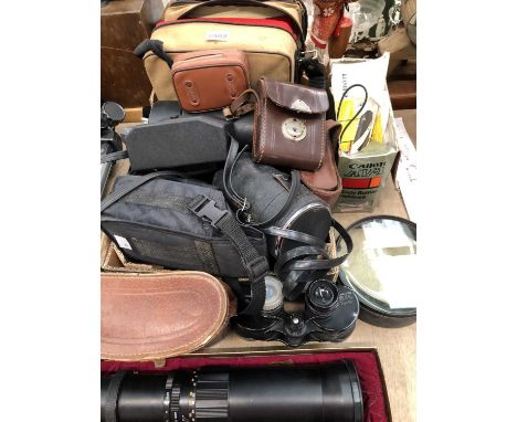 A Soligor 1:8 camera lens, Fujica and other cameras together with a pair of cased binoculars, a Hawkette bakelite and other c