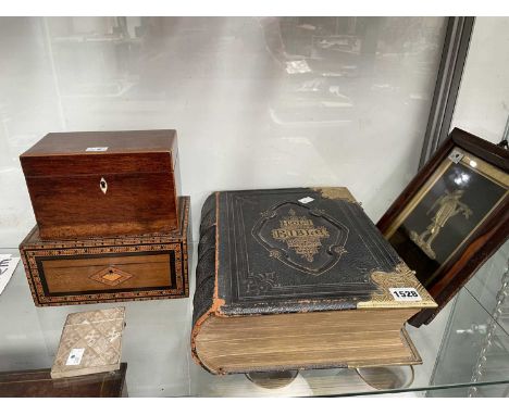 A Tunbridge work box, a mahogany tea caddy, a mother of pearl card case, a family bible and a framed ilt metal relief of a fi