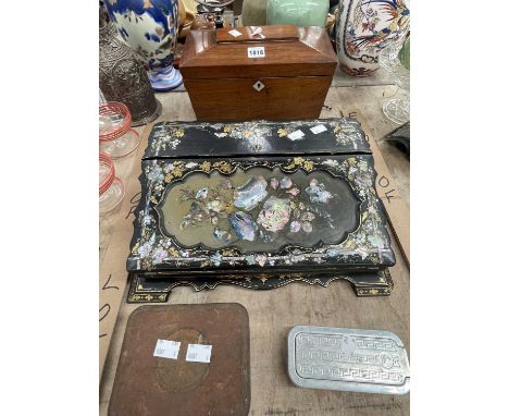 A 19th century mother of pearl inlaid black lacquer writing slope, a rosewood tea caddy, a tin cased primus stove and a Rolls