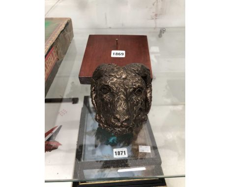 A boxed Scrabble set together with a Jean Creighton sculpted bronze ram's head with a mahogany panel for its wall hangingProv