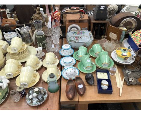 Grosvenor, Wedgwood and other coffee wares, a boxed microscope, mantel clocks, a metronome, kitchen scales, platters, etc.
