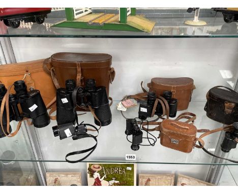 Five leather cased pairs of binoculars together with a monocular